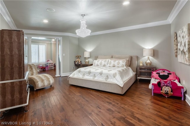 bedroom with a chandelier, crown molding, dark wood-type flooring, and decorative columns