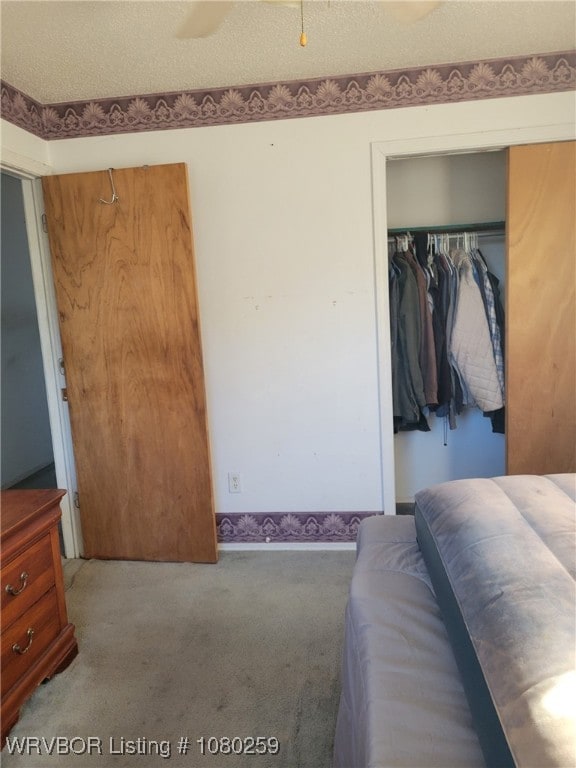 113614 S 4640th Rd, Gans, OK 74936 - bedroom featuring carpet flooring and a closet