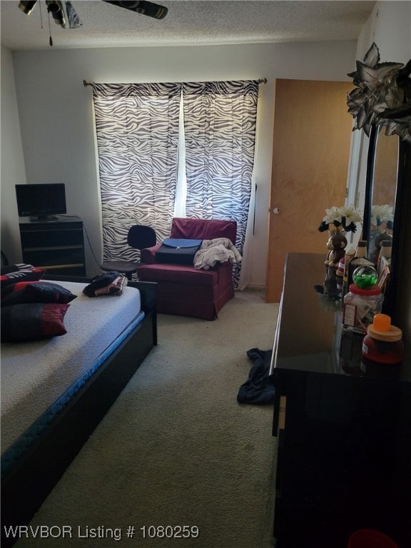 113614 S 4640th Rd, Gans, OK 74936 - bedroom with carpet flooring and a textured ceiling