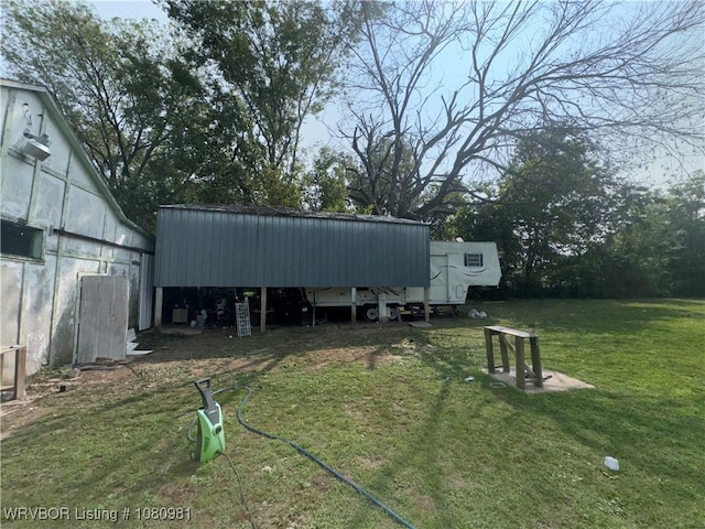 1221 S 3rd St, Stilwell, OK 74960 - view of green lawn featuring an outbuilding