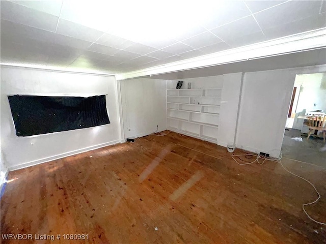 1221 S 3rd St, Stilwell, OK 74960 - basement featuring wood finished floors and built in features