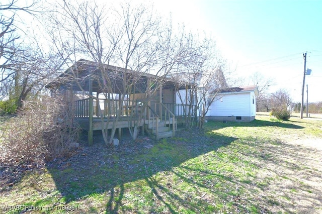 1221 S 3rd St, Stilwell, OK 74960 - view of green lawn with a deck