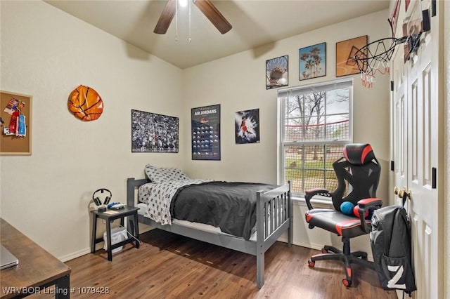 1111 Ridge Dr, Stilwell, OK 74960 - bedroom featuring wood finished floors, baseboards, and a ceiling fan