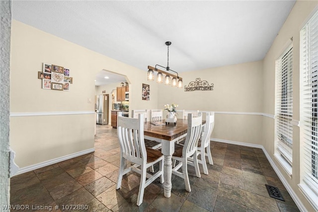 dining room featuring an inviting chandelier