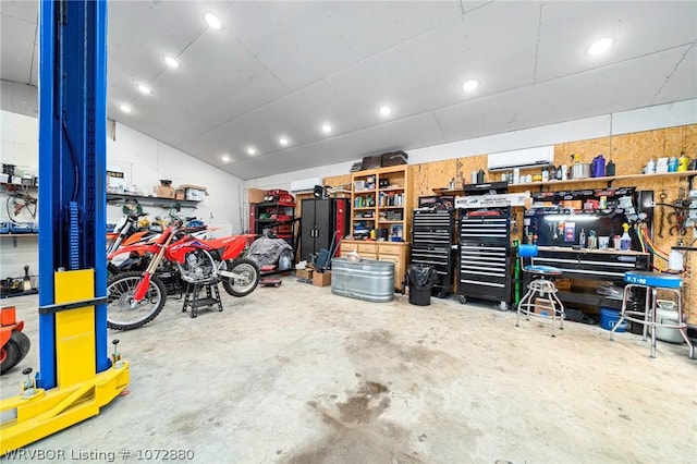 garage with a workshop area