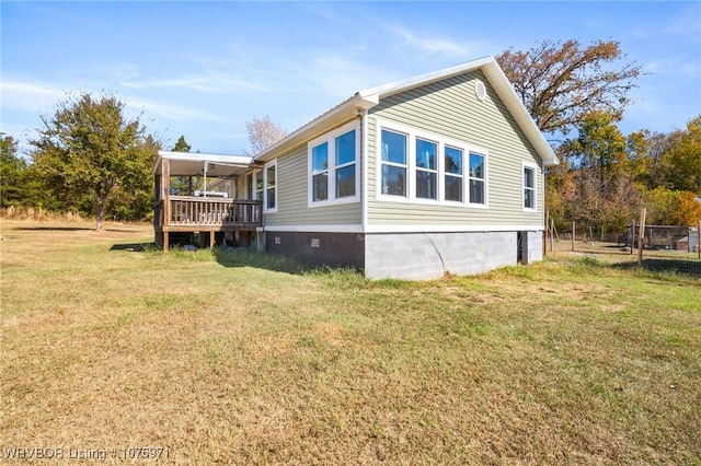 view of property exterior with a yard