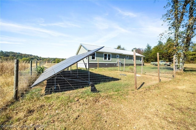 exterior space with a rural view