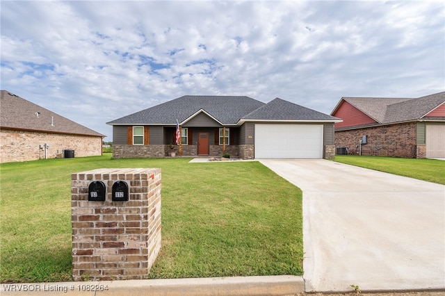 112 Countryside Way, Pocola, OK 74902 - view of front of property featuring an attached garage, driveway, and a front yard