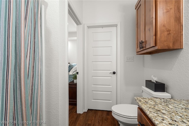 112 Countryside Way, Pocola, OK 74902 - bathroom featuring wood finished floors, vanity, and a textured wall