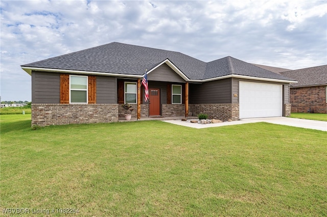 112 Countryside Way, Pocola, OK 74902 - view of front of home with concrete driveway, a garage, brick siding, and a front lawn