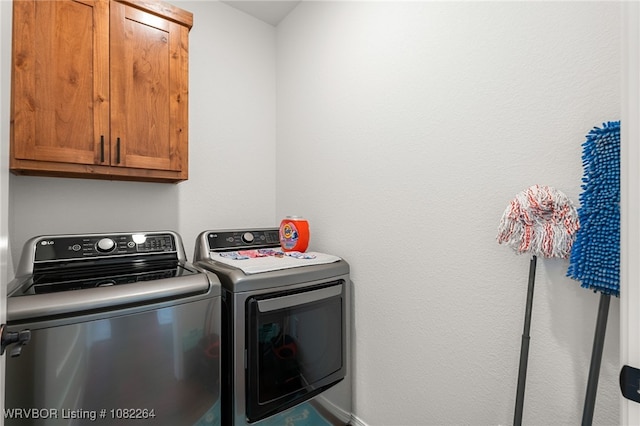 112 Countryside Way, Pocola, OK 74902 - laundry area with separate washer and dryer and cabinet space