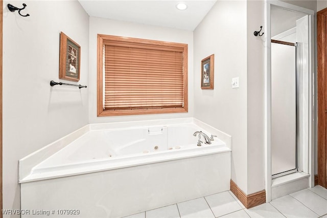 full bathroom featuring recessed lighting, a jetted tub, tile patterned flooring, and a stall shower
