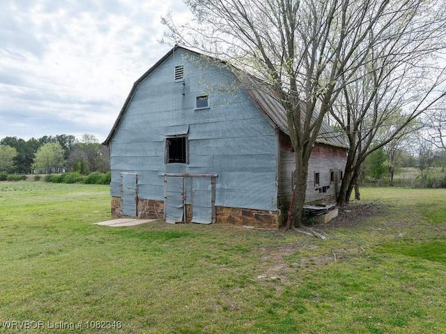 627 Parks Dr, Charleston, AR 72933 - view of barn with a yard