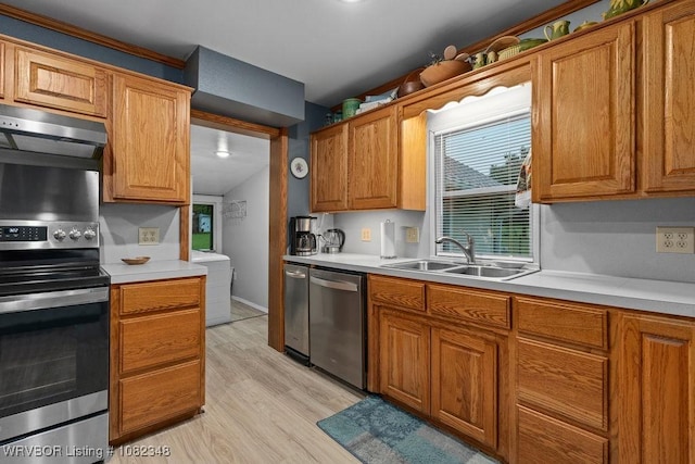627 Parks Dr, Charleston, AR 72933 - kitchen featuring appliances with stainless steel finishes, extractor fan, light countertops, and light wood-style floors