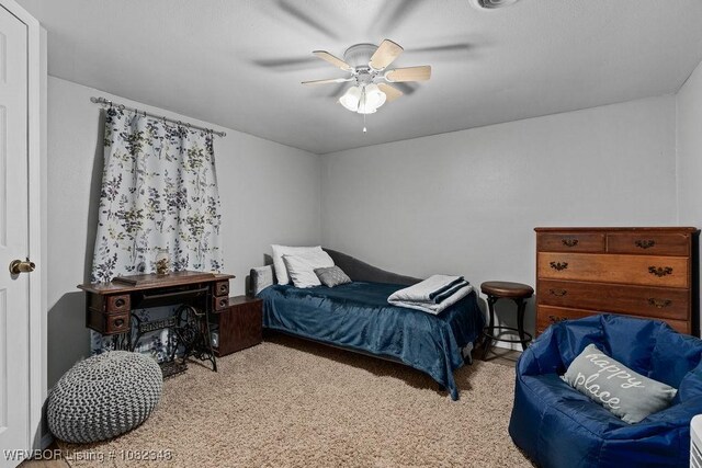 627 Parks Dr, Charleston, AR 72933 - carpeted bedroom with ceiling fan