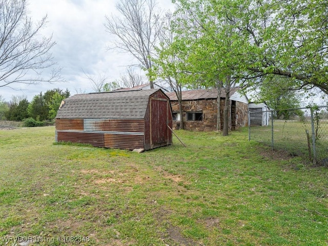 627 Parks Dr, Charleston, AR 72933 - view of yard featuring a barn and an outbuilding
