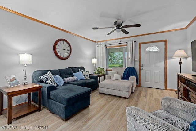 627 Parks Dr, Charleston, AR 72933 - living room with light wood finished floors, a ceiling fan, and ornamental molding