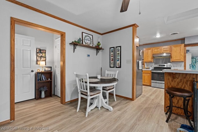 627 Parks Dr, Charleston, AR 72933 - dining area featuring crown molding, light wood finished floors, and ceiling fan