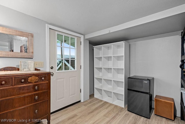 627 Parks Dr, Charleston, AR 72933 - entryway featuring light wood-style floors