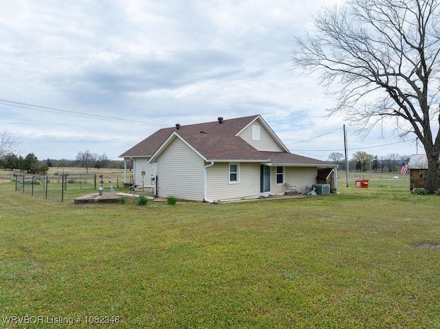 627 Parks Dr, Charleston, AR 72933 - back of property with a shingled roof