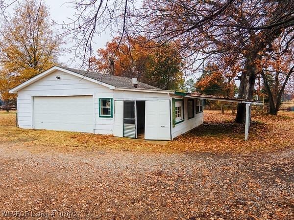 exterior space with a garage