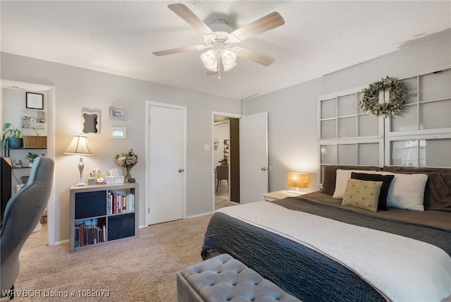 1008 Pattie Ln, Barling, AR 72923 - bedroom featuring light colored carpet, ceiling fan, and a textured ceiling