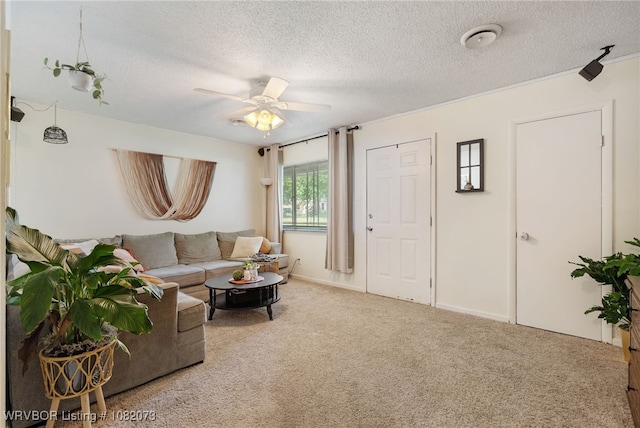 1008 Pattie Ln, Barling, AR 72923 - carpeted living area with a ceiling fan and a textured ceiling