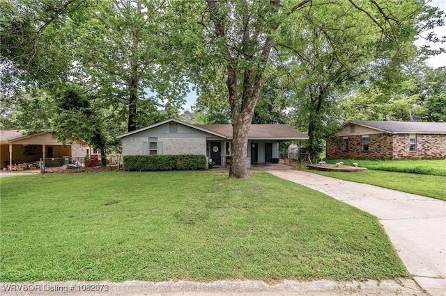 1008 Pattie Ln, Barling, AR 72923 - single story home with driveway, a front yard, a carport, and brick siding