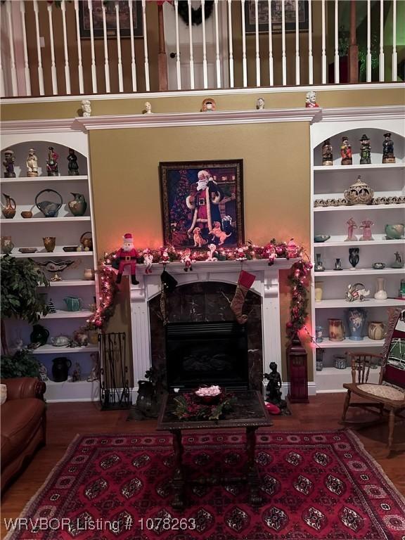 21 Bermuda Ct, Mountain Home, AR 72653 - living room featuring a fireplace and wood finished floors