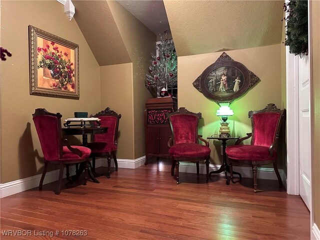 21 Bermuda Ct, Mountain Home, AR 72653 - sitting room featuring vaulted ceiling, wood finished floors, a textured ceiling, and baseboards
