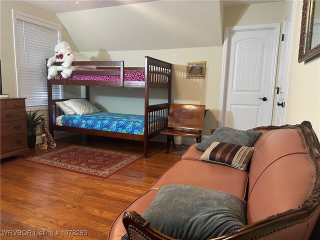 21 Bermuda Ct, Mountain Home, AR 72653 - bedroom with wood finished floors and vaulted ceiling