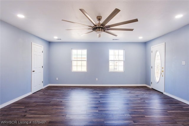 entryway with ceiling fan and dark hardwood / wood-style flooring