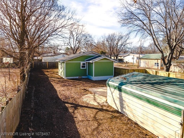 exterior space featuring an outbuilding