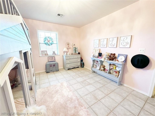 game room with light tile patterned floors