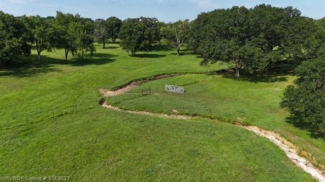 birds eye view of property featuring a rural view