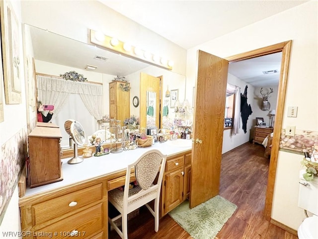 bathroom with hardwood / wood-style floors, vanity, and a shower with curtain