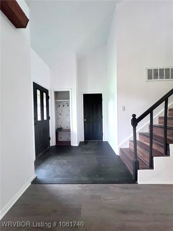 2015 Woodwind Way, Van Buren, AR 72956 - entryway with stairway, concrete flooring, and high vaulted ceiling