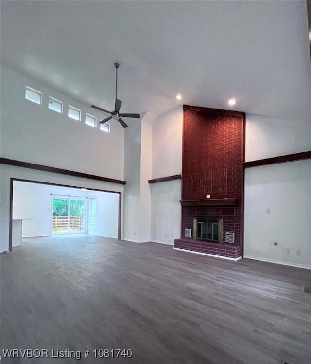 2015 Woodwind Way, Van Buren, AR 72956 - unfurnished living room featuring high vaulted ceiling, wood finished floors, a ceiling fan, a fireplace, and recessed lighting
