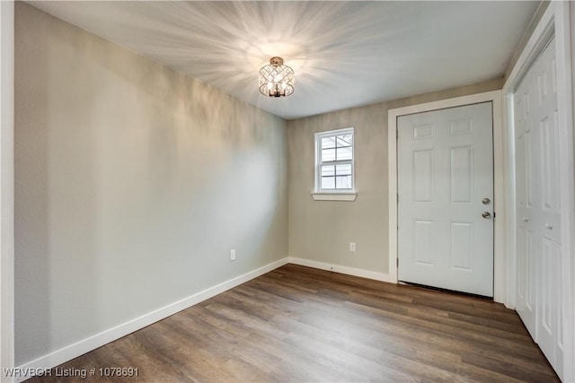 interior space with dark wood-type flooring