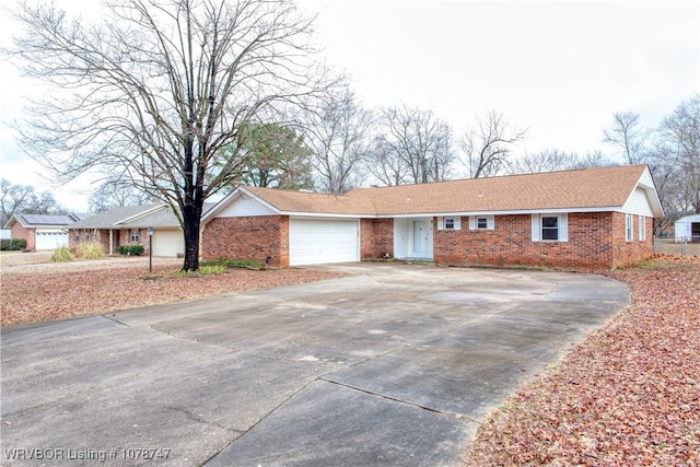 single story home featuring a garage