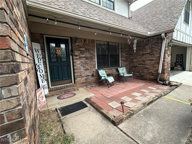 doorway to property with a porch