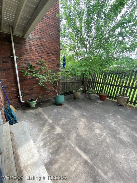 1500 S Albert Pike Ave Unit 40, Fort Smith, AR 72903 - view of patio / terrace featuring fence
