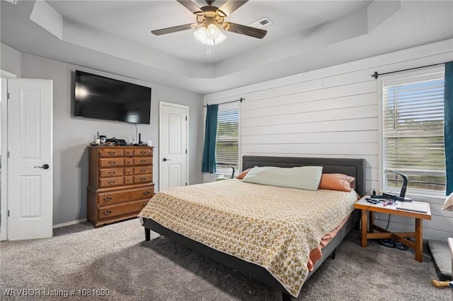 2207 Lisa Ln, Van Buren, AR 72956 - carpeted bedroom featuring a raised ceiling and ceiling fan