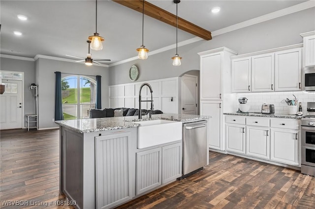 2207 Lisa Ln, Van Buren, AR 72956 - kitchen with stainless steel appliances, arched walkways, a ceiling fan, crown molding, and backsplash