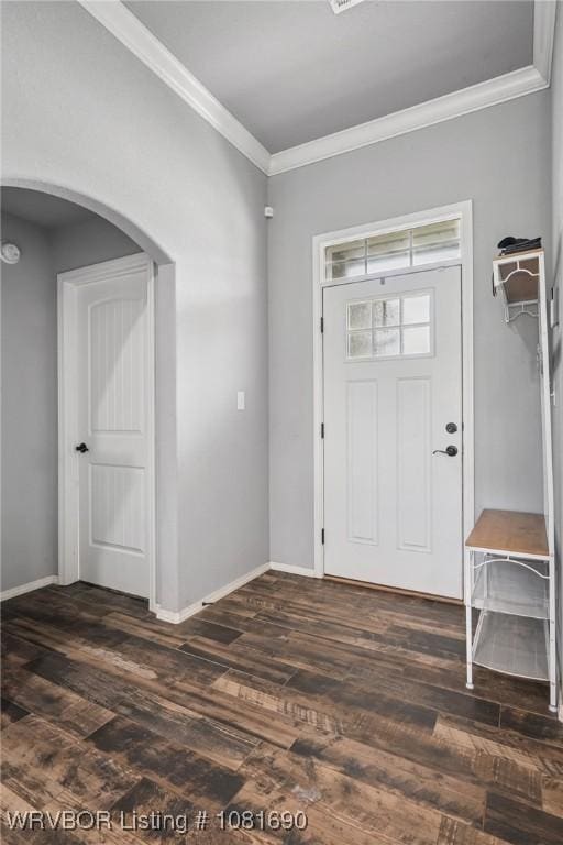 2207 Lisa Ln, Van Buren, AR 72956 - entryway featuring arched walkways, ornamental molding, and dark wood-type flooring