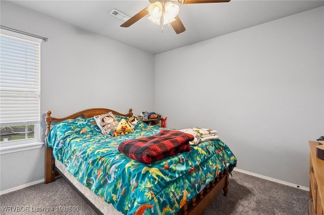 2207 Lisa Ln, Van Buren, AR 72956 - carpeted bedroom with baseboards and ceiling fan