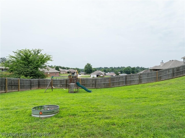 2207 Lisa Ln, Van Buren, AR 72956 - fenced backyard with a playground