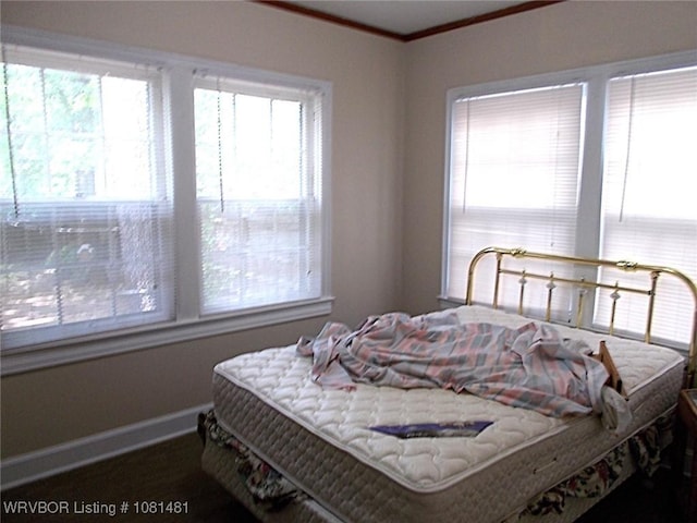 619 N 40th St, Fort Smith, AR 72903 - bedroom featuring crown molding and baseboards