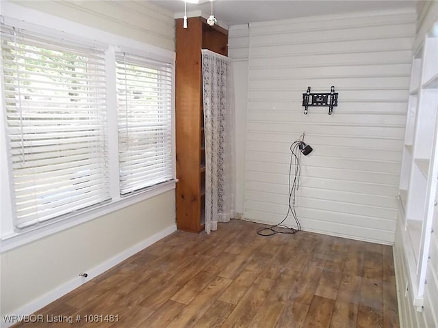 619 N 40th St, Fort Smith, AR 72903 - unfurnished dining area with wood finished floors and baseboards
