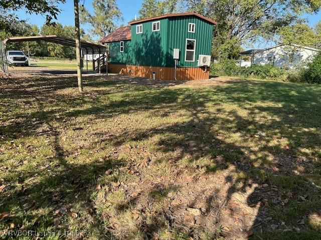 view of yard featuring a carport